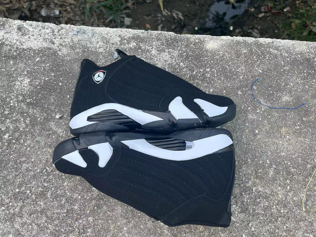 Air Jordan 14 Black and White Sneakers